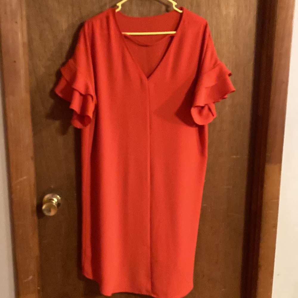 No label tag. Looks like xl. Hasn t been worn. Polyester, very good condition.